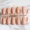 Set 24 unghii false adezive tip press ON lungi rotunjite model glossy Nude Set 24 unghii false adezive tip press ON lungi rotunjite model glossy Nude