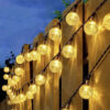 Ghirlanda becuri solare decorativa, 100 becuri lumina calda, 12 m, Transparent / Negru Ghirlanda becuri solare decorativa, 100 becuri lumina calda, 12 m, Transparent / Negru