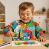 Sort impermeabil pictura pentru copii cu varsta intre 1-3 ani, Multicolor Sort impermeabil pictura pentru copii cu varsta intre 1-3 ani, Multicolor