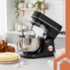 Robot de bucatarie tip mixer profesional cu bol inox de 5.7L si putere 2000W KESNUP, display LCD touchscreen, 11 trepte viteza, mod de incalzire si comenzi intuitive, ideal pentru amestecare, batere, rulare, fermentare, accesorii incluse, Rose Gold